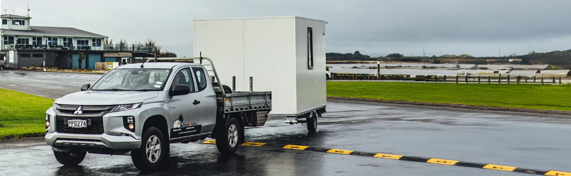 transporting a small house, highlighting an innovative way to combine travel and home
